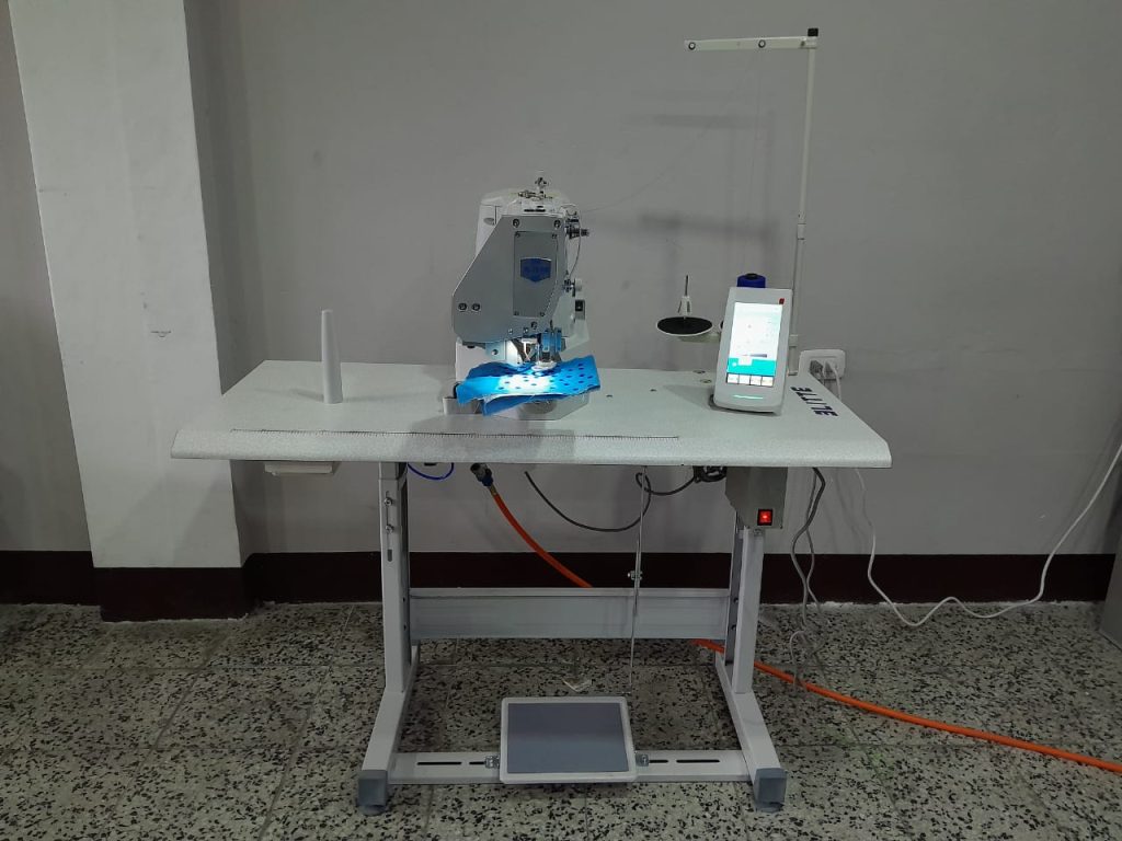 Máquina para ojales de gorra