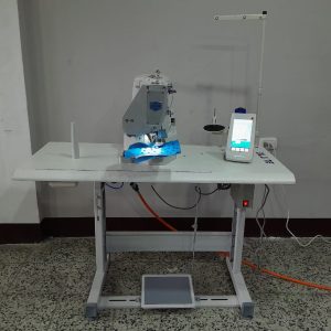 Máquina para ojales de gorra